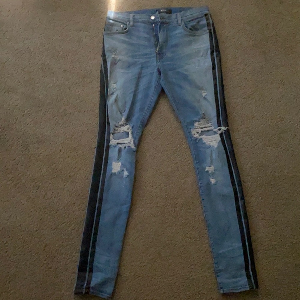 Amiri jeans with black stripes